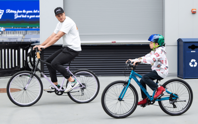 Hunter Henry hooks local teens in foster care up with new bicycles with support from Patriots teammates Drake Maye, Mack Hollins, and Efton Chism III